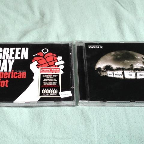 troc de  Album d'Oasis et Green Day, sur mytroc