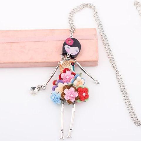 troc de  Pendentif "doll" neuf, sur mytroc