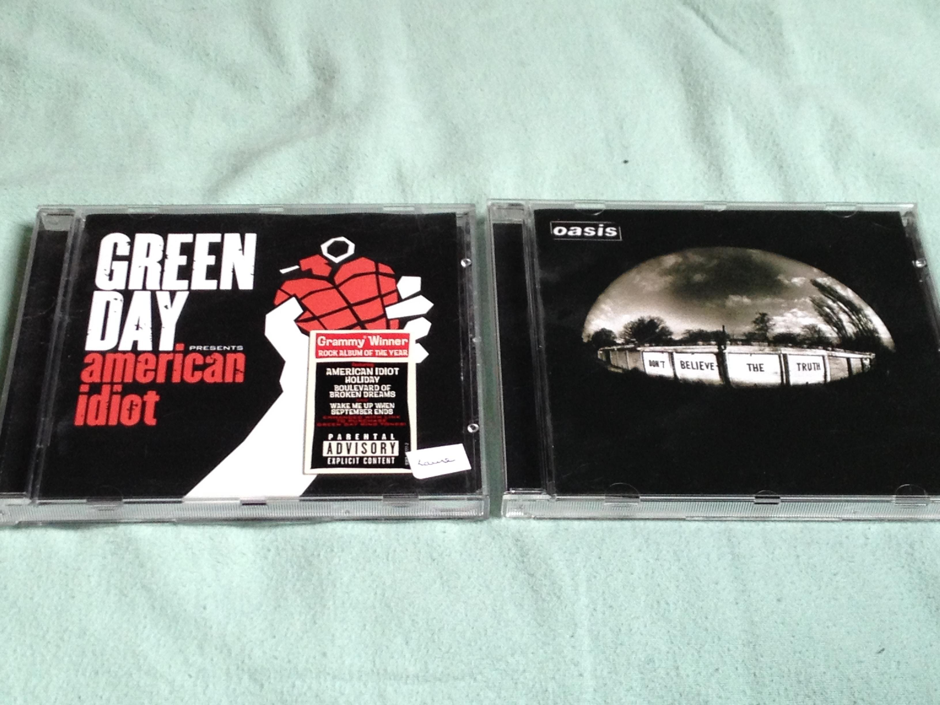 troc de troc album d'oasis et green day image 0